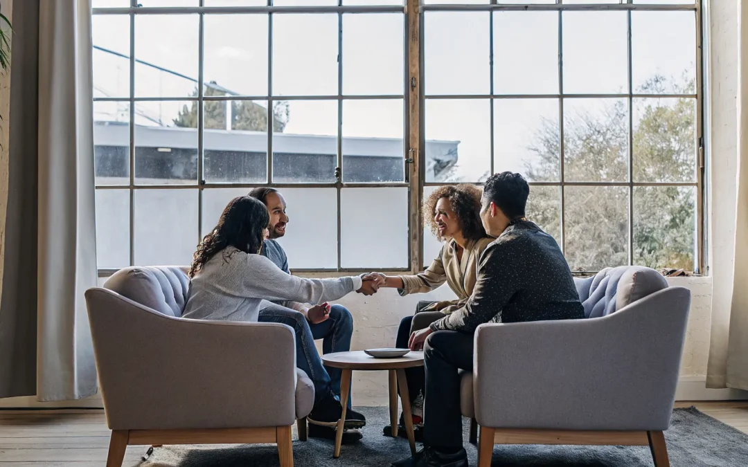 Family in a drug and alcohol counseling session with a therapist.